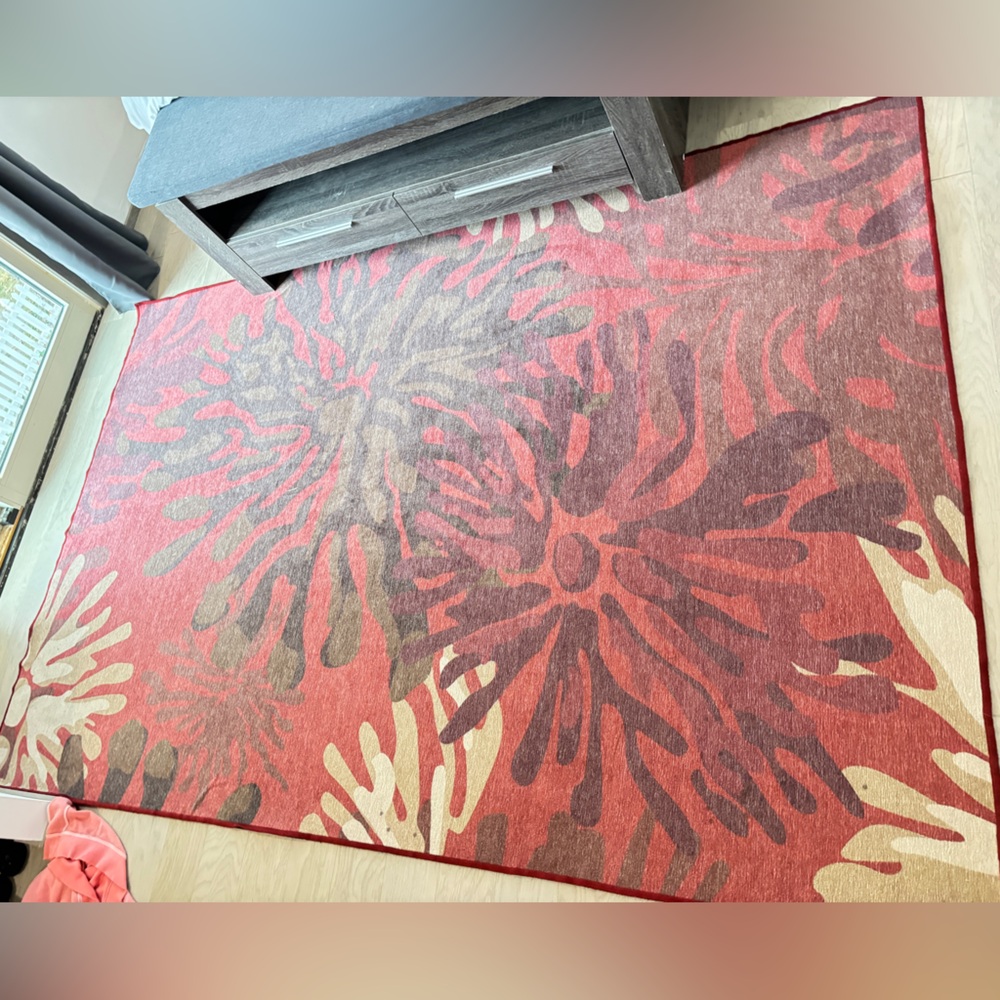 Vibrant Ruggable Floral Area Rug in Red and Brown (top only)